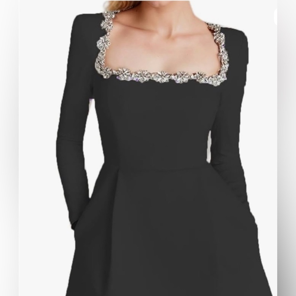 Elegant Black Dress with Embellished Neckline